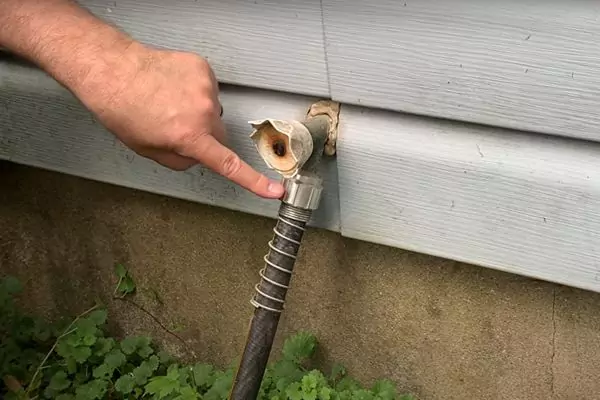 how do you get a nozzle unstuck from a hose